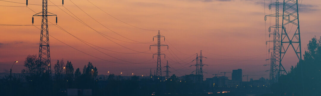 Energy power lines during sunset