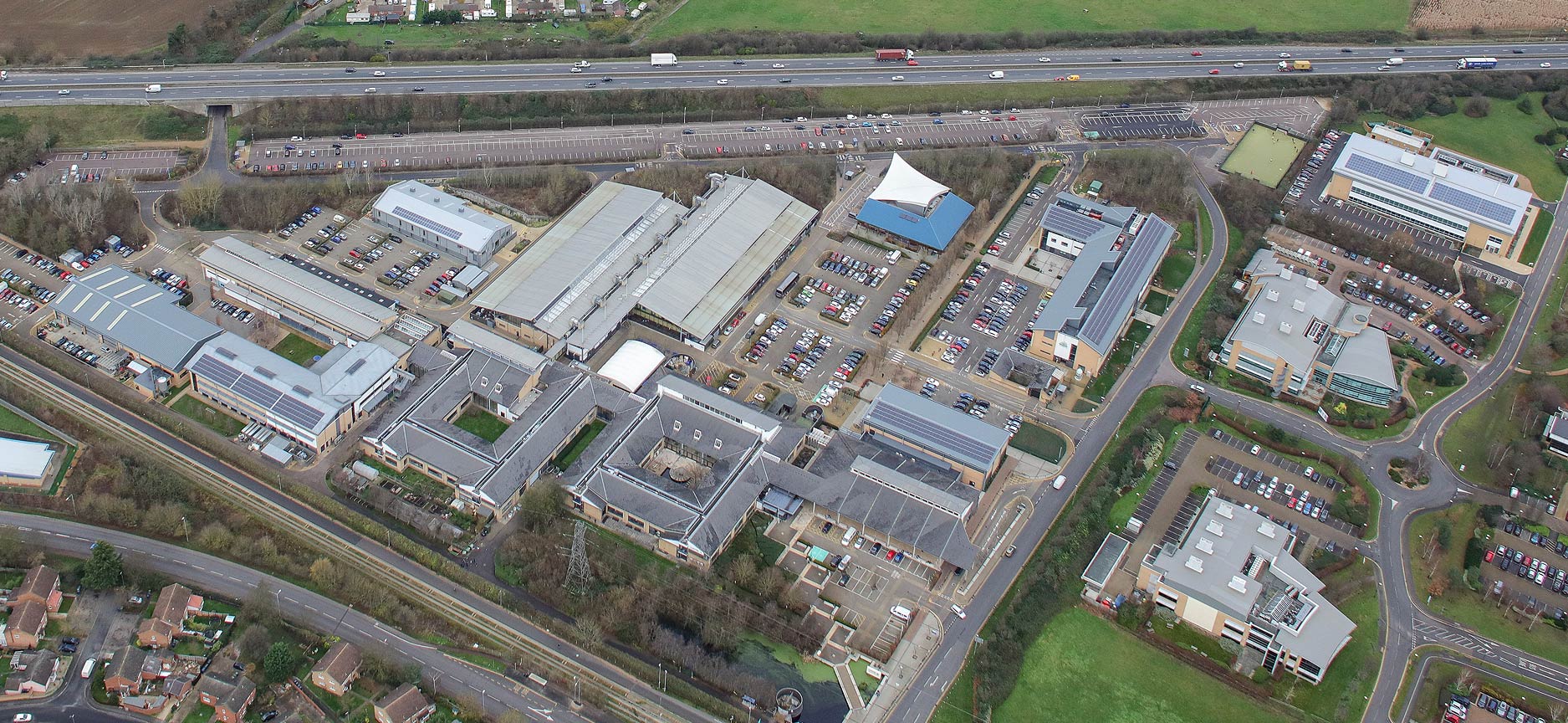 An array of solar panels spanning multiple buildings