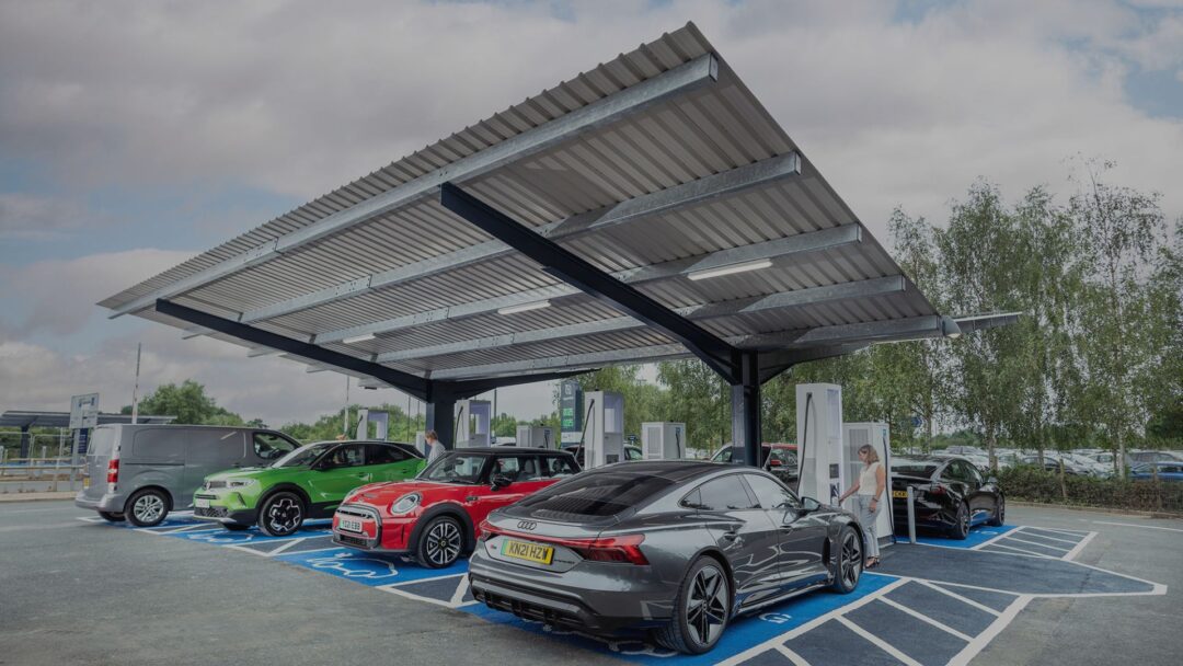 electric cars under a solar cartport canopy