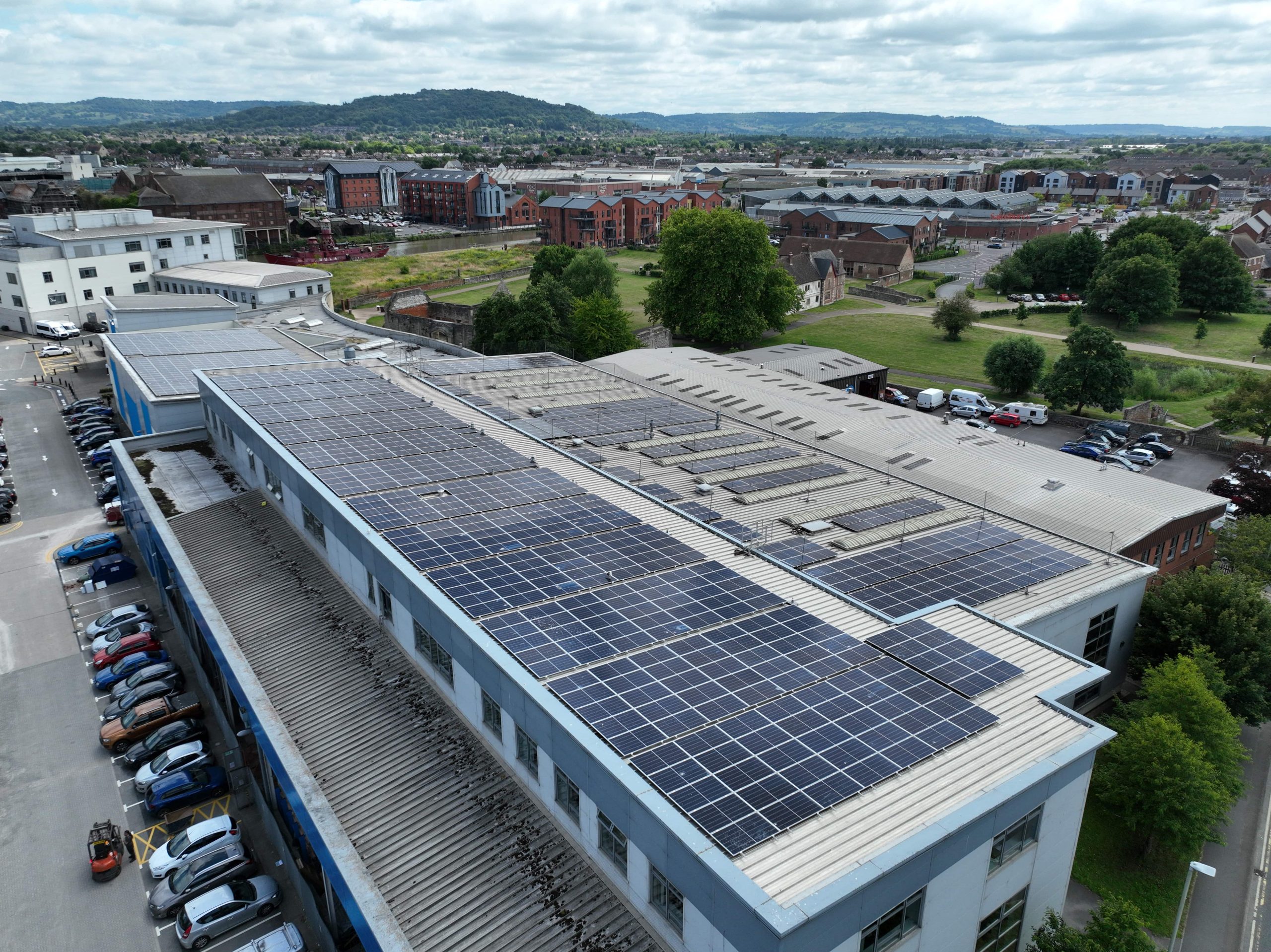 solar panels on a flat roof of a college building