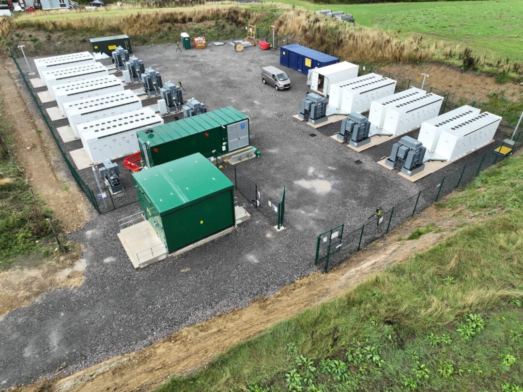 Tesla Megapack batteries placed in an open field