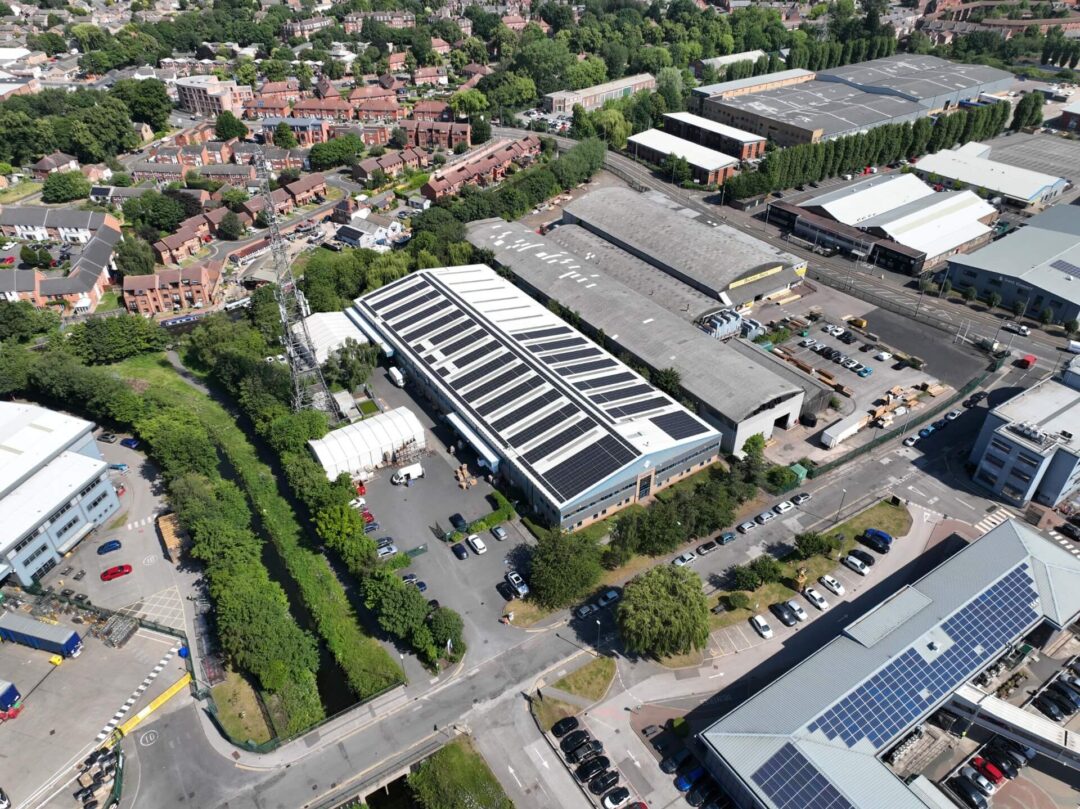 Solar panels atop a textiles producing company building