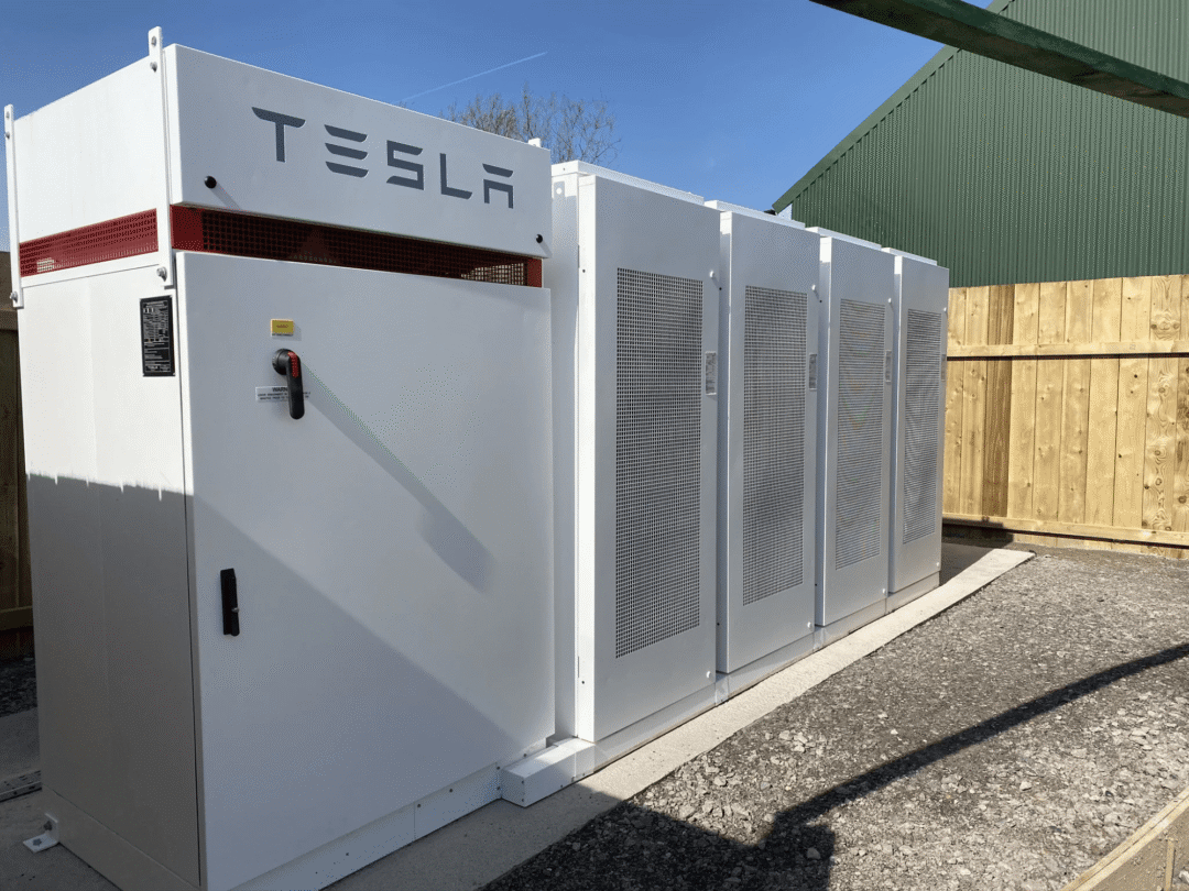 Tesla battery storage systems installed outdoors, highlighting scalable energy storage solutions for businesses.