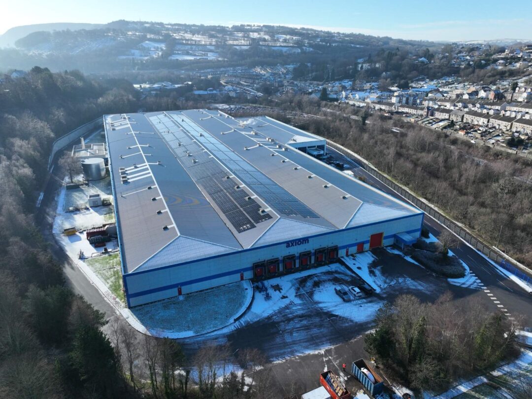 solar panels on top of manufacturing warehouse
