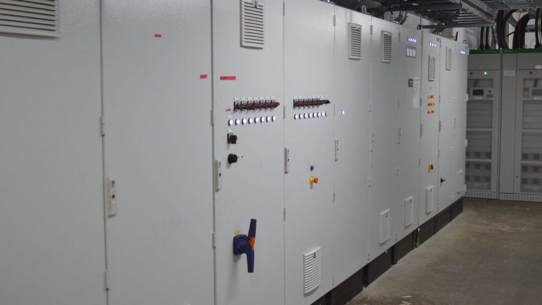 Indoor electrical switchgear cabinets and control panels used for managing power distribution in a commercial or industrial renewable energy system in Cranswick Eye