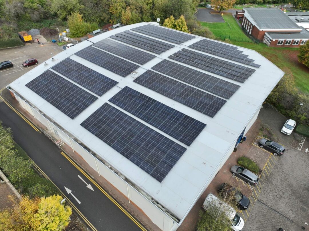 Sculpting sustainability Gymnasium's graceful curve hosts efficient solar panels.