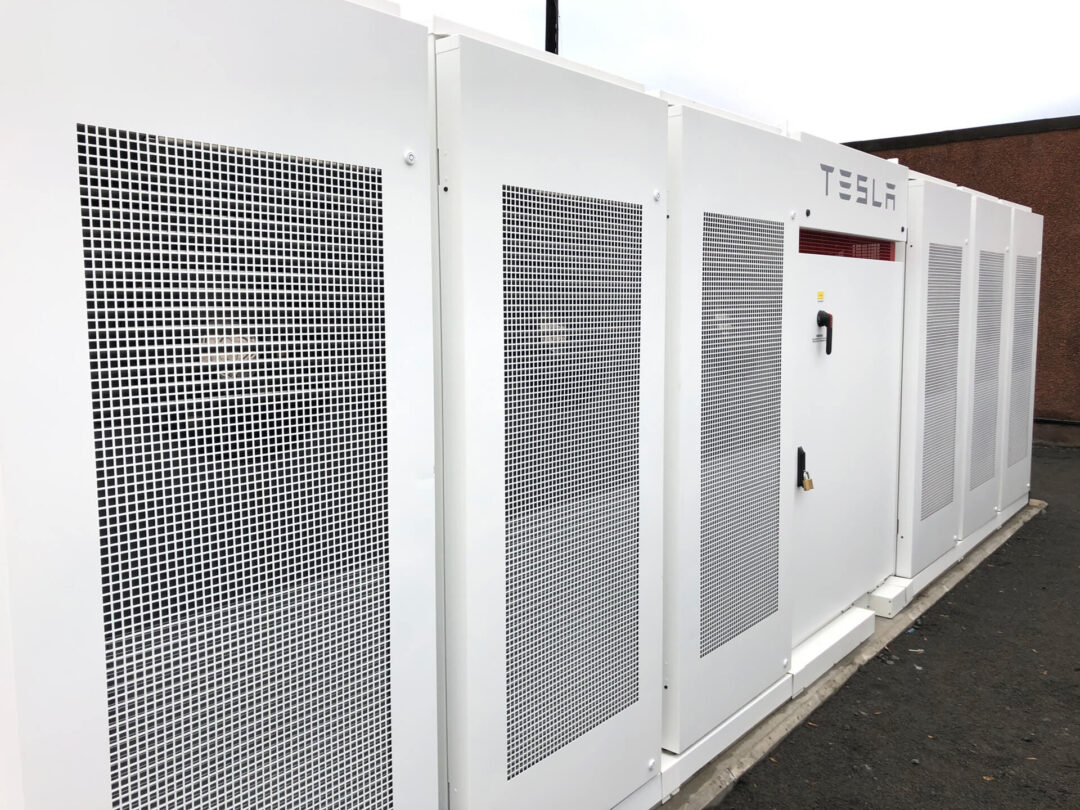 white tesla megapack battery outside