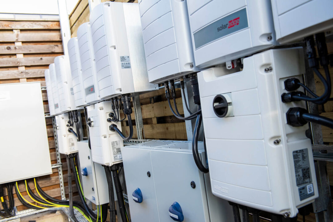 solaredge inverters outside building pwoering solar pv system