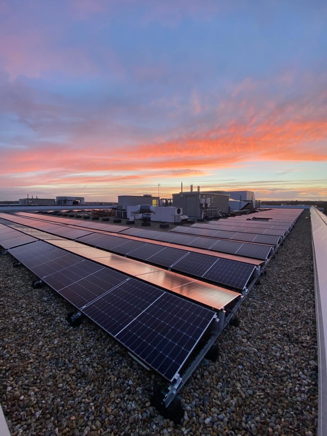 solar panels corner roof sunset