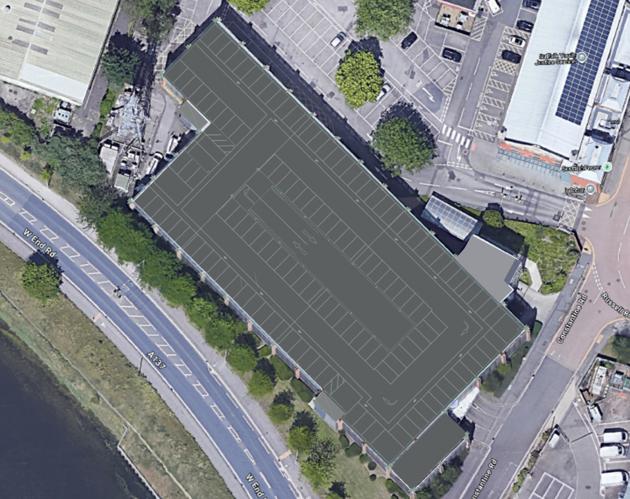 Aerial site layout showing rooftop solar feasibility design for Laser Energy commercial building.